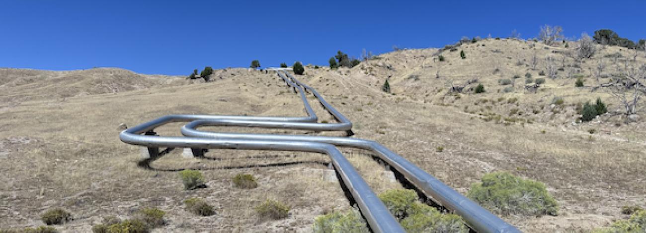Geothermal powerplant pipes crossing over Utahs West Desert
