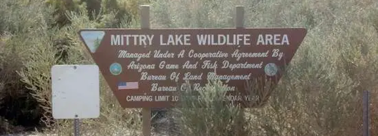 Sign at Mittry Lake listing co-management partners; Bureau of Land Management, Bureau of Reclamation, and Arizona Game and Fish Department