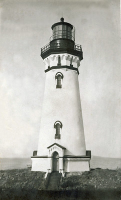 An old photo of a victorian light house.