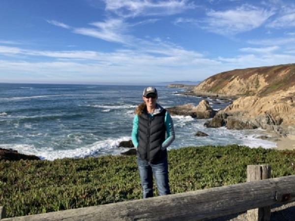 Carine Schlesinger with the ocean in the background. 