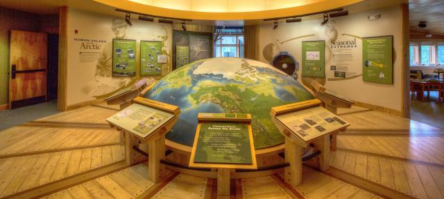 Visitor Center exhibits showing the top of the globe