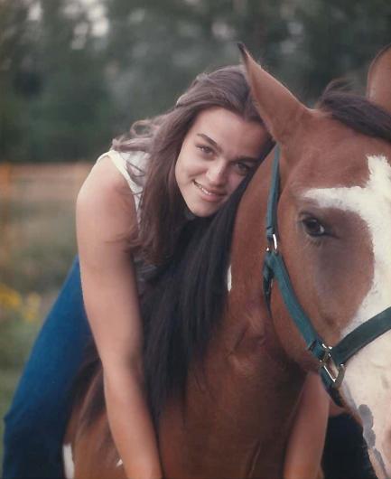 Jill Herold's high school senior picture with Guardian, her American mustang. 