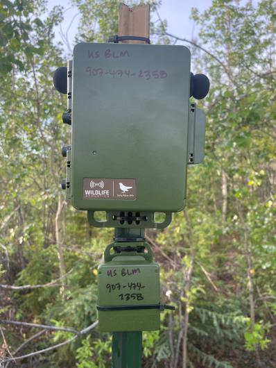 Close up of automated recording unit mounted to a post.