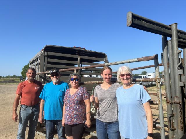 Wild Horse and Burro Specialist Tim Colon with some happy adopters from Yukon, Oklahoma.