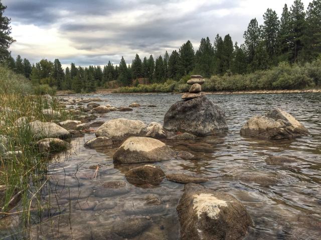 rocks sticking up from the river