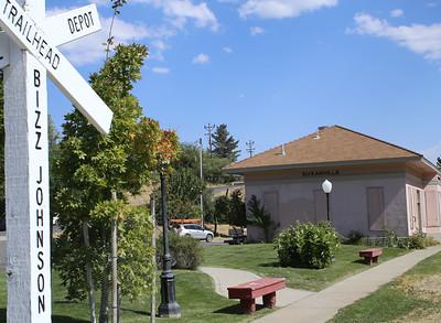 Susanville Railroad  Depot, a white building next to rail road tracks.