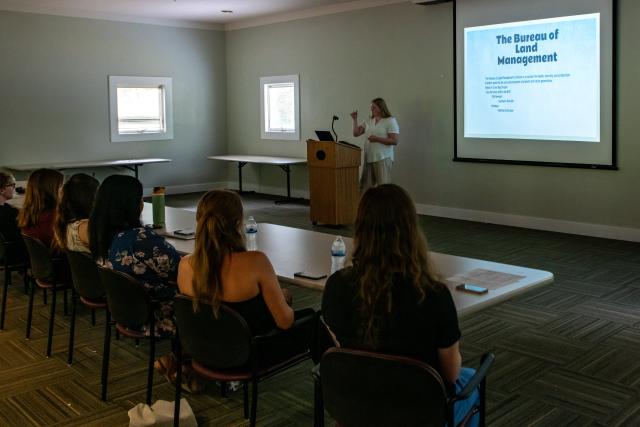 Daphne gives a presentation to the other Hutton interns on her BLM experience. BLM photo.