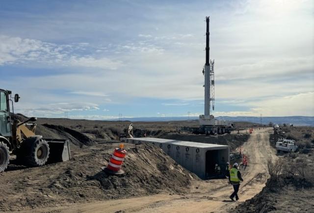 Project crews work to replace and install a box culvert along 18 Road near the North Fruita Desert.