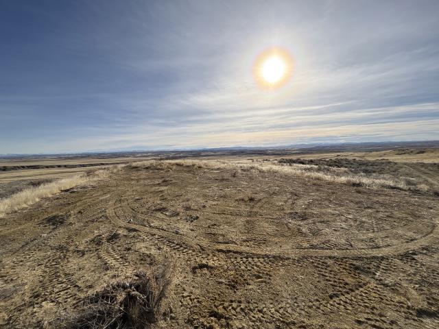 An open landscape has recently had buildings removed from it.