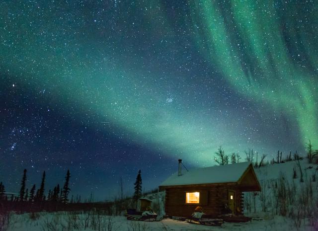 wolf run cabin under the northern lights