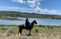 An equestrian enjoying the view of the Snake River from the American Falls Archaeological District