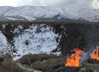 The BLM burns slash piles in the Southwest District when conditions permit.