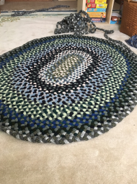 multi-colored wool braided rug. 
