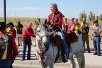 A Pony Express rider is greeted at the Trails Center in Casper. 