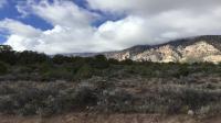 Shaded landscape with cloud cover.