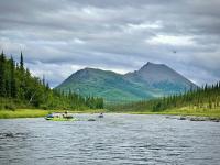 Team of researchers floating on the South Fork River