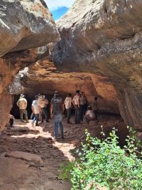 Boy scout group in an alcove with BLM employees