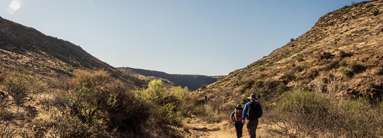 People hike Badger Springs Trail