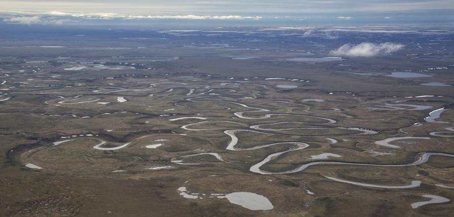 Aerial photo of the tundra and rivers of the Northeast National Petroleum Reserve in Alaska.