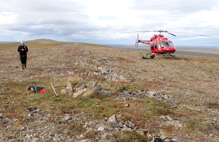 An archaeologist surveys a remote Alaskan site. 