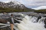 Angler standing at Delta Wild and Scenic River falls