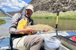 BLM Fisheries Biologist Cody McLean with one of the largest Brown trout fishes caught during the survey.